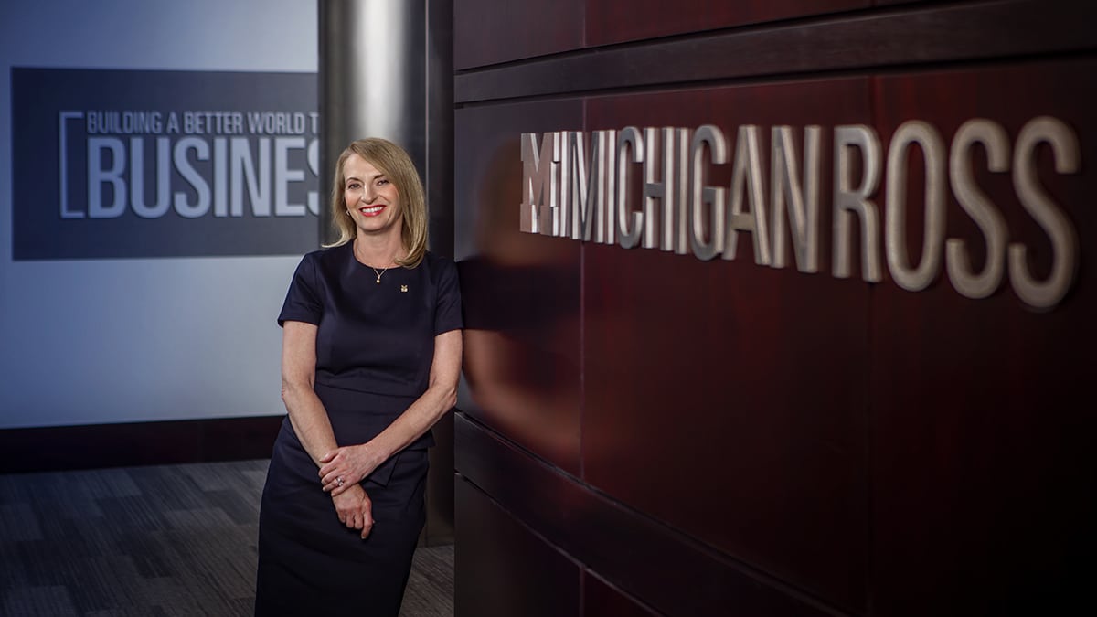 Image of Dean Sharon Matusik next to "Michigan Ross" lettering