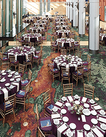 Banquet tables set up in the Winter Garden.